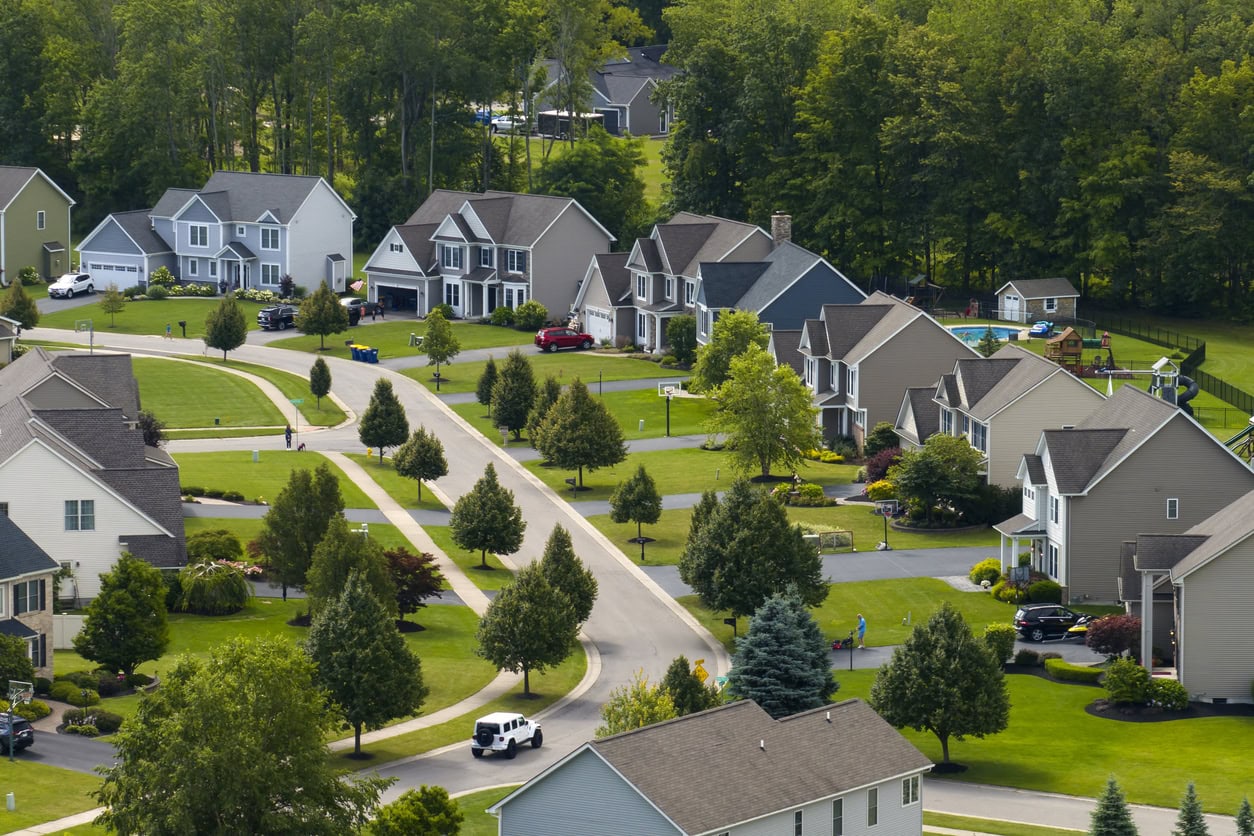 hoa management company overseeing residential community neighborhood with homes and streets