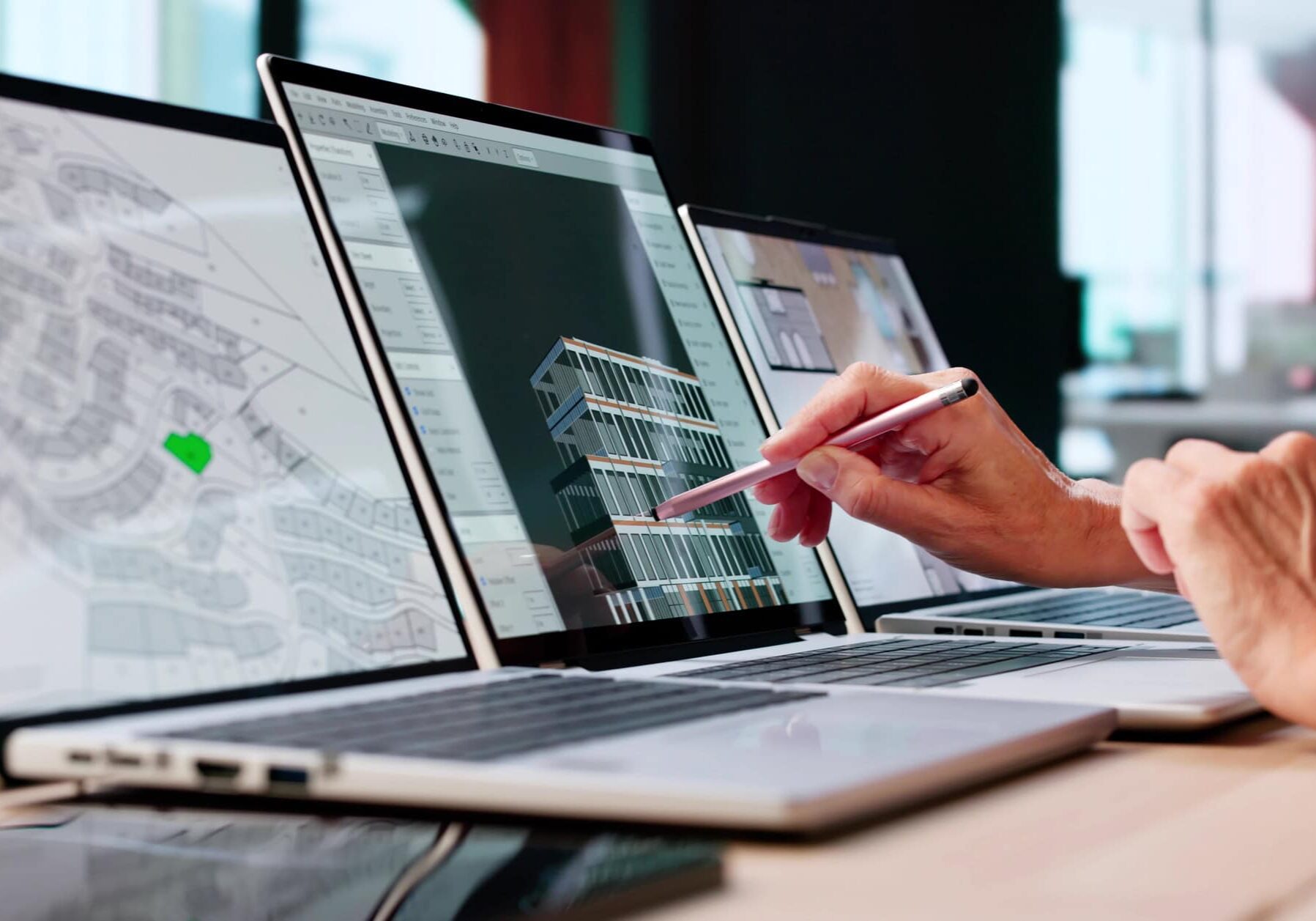 Homeowner resources showing architectural plans on a laptop for submitting design requests